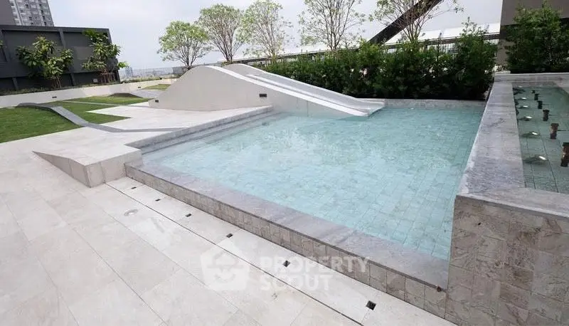 Luxurious rooftop pool with modern design and lush greenery
