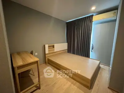 Modern minimalist bedroom with wooden furniture and sleek design