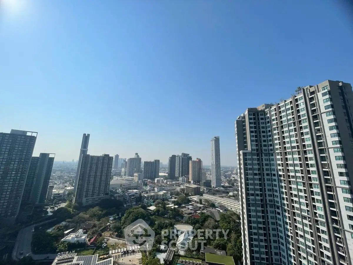 Stunning cityscape view from high-rise building balcony
