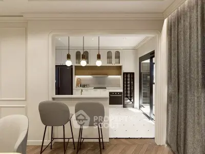 Modern kitchen with open layout and stylish bar seating in elegant apartment.