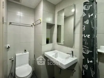 Modern bathroom with sleek fixtures and stylish decor
