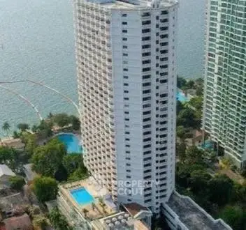 Stunning high-rise building with panoramic water views and luxurious amenities.