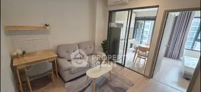 Modern living room with cozy sofa and dining area in open layout apartment