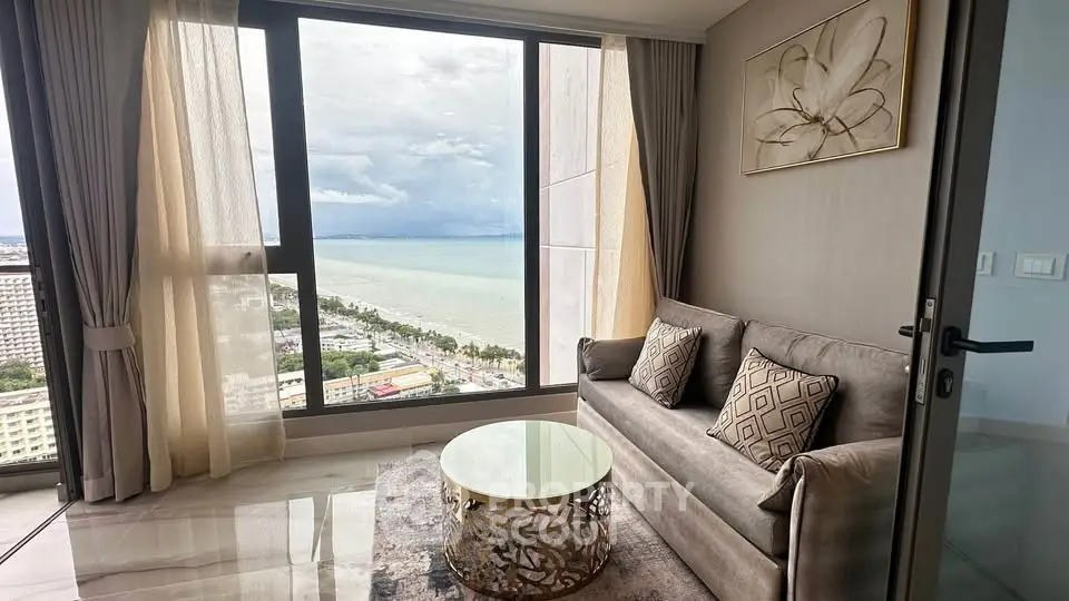 Luxurious living room with stunning ocean view and elegant decor