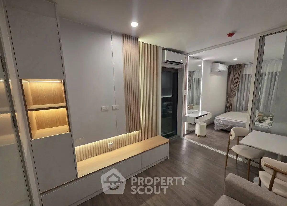 Modern apartment interior with stylish living area and cozy bedroom