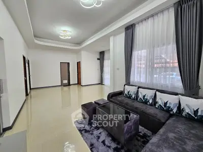 Spacious modern living room with elegant decor and plush seating
