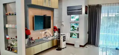 Modern living room with sleek TV setup and stylish decor
