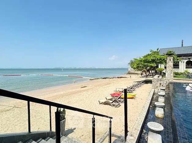 Stunning beachfront property with pool and ocean view, perfect for luxury living.