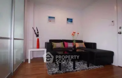 Cozy living room with modern decor and comfortable seating