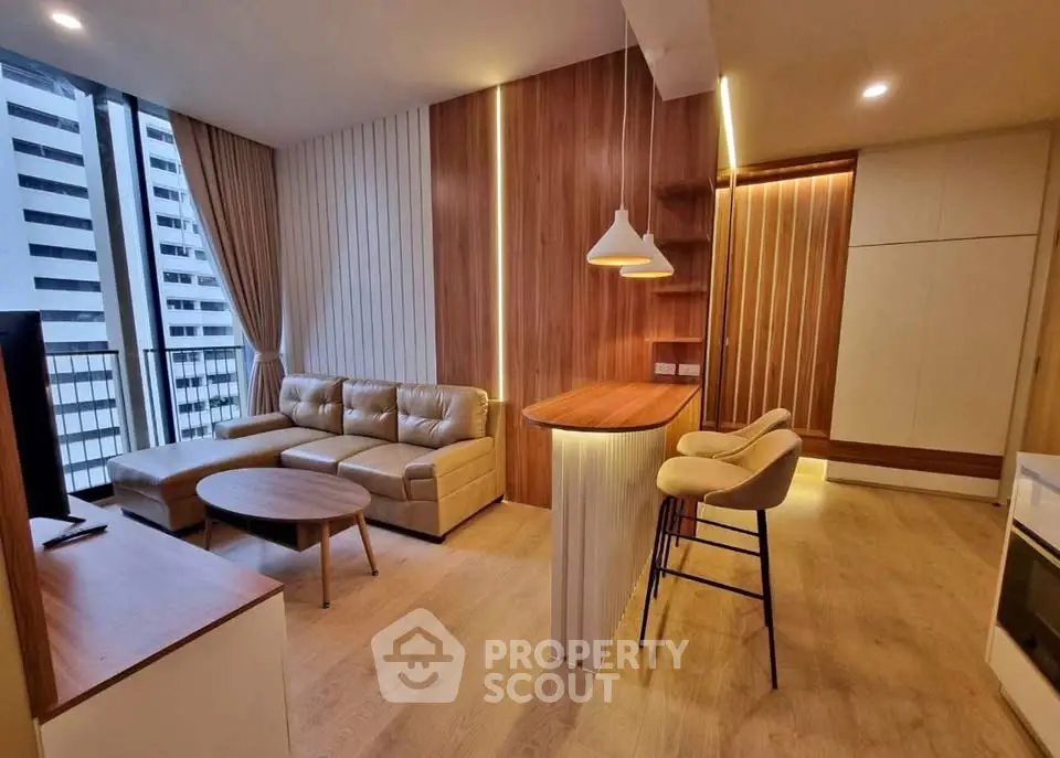 Modern living room with stylish decor and open layout in a high-rise apartment.