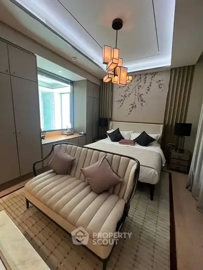 Luxurious bedroom with elegant decor and modern lighting