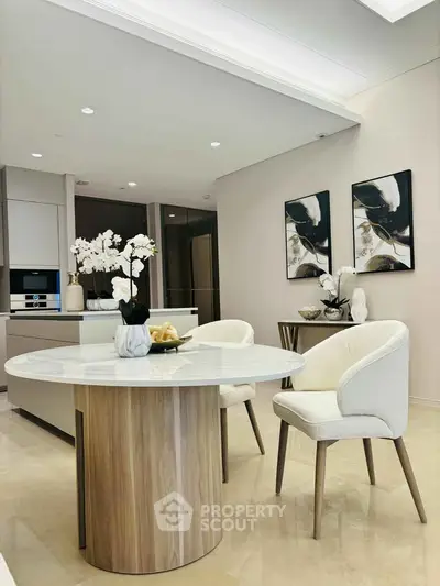 Elegant modern dining area with stylish decor and open kitchen layout