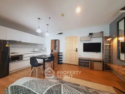 Modern open-plan living room with kitchen and stylish decor