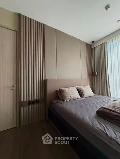 Luxurious bedroom with modern design and natural light