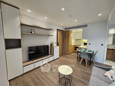 Modern living room with open kitchen and stylish decor