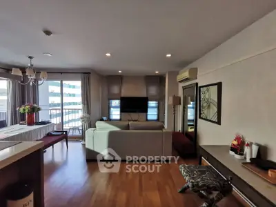 Spacious living room with modern decor and natural light