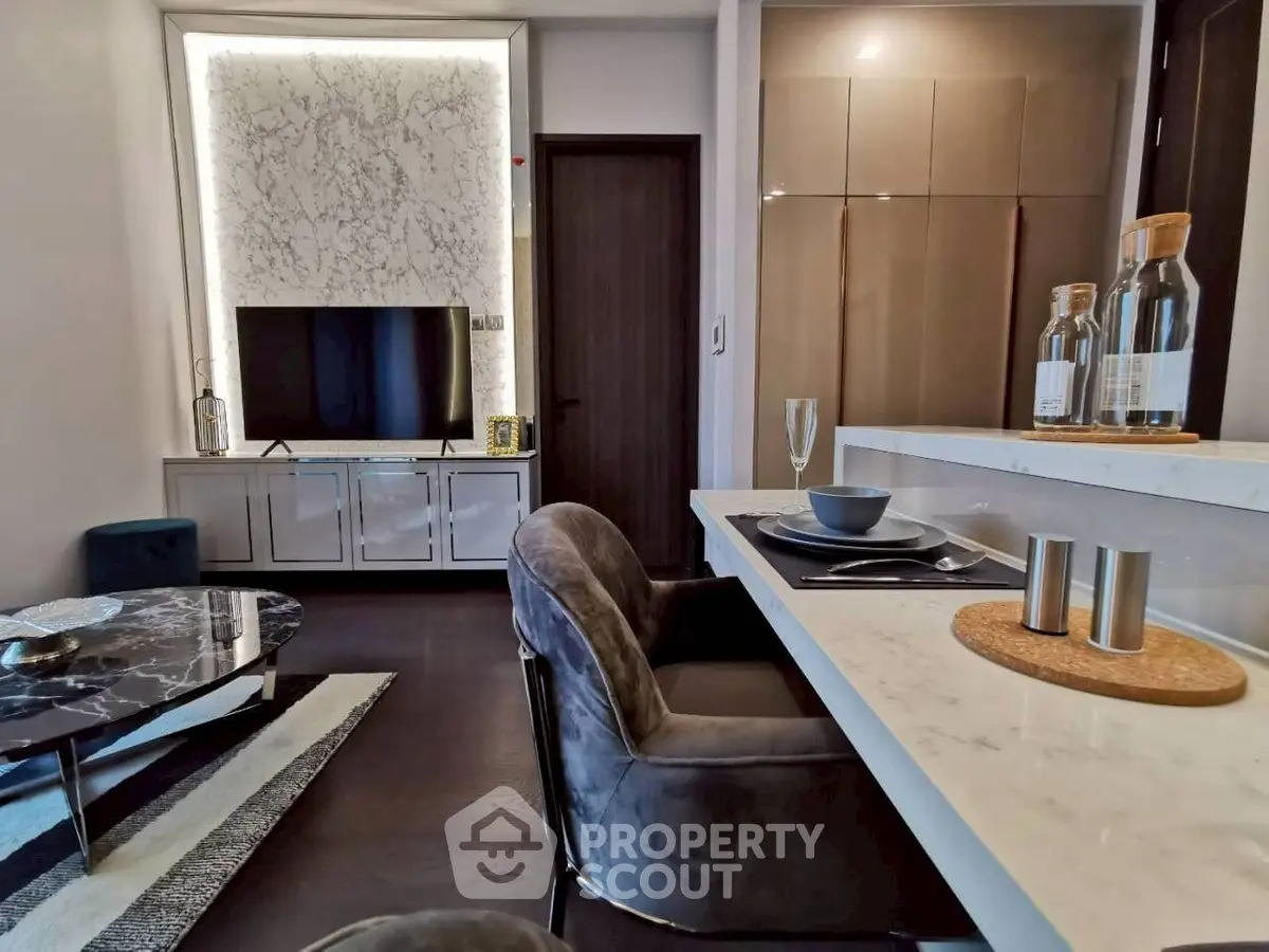 Modern living room with stylish decor and open kitchen layout