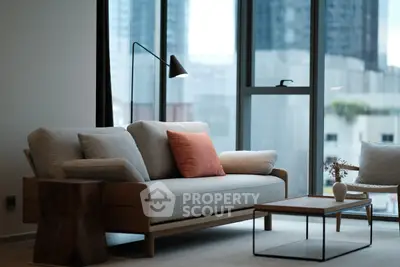 Modern living room with stylish sofa and city view
