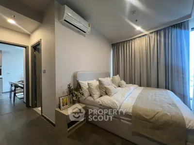 Modern bedroom with cozy bed and stylish decor in a contemporary apartment