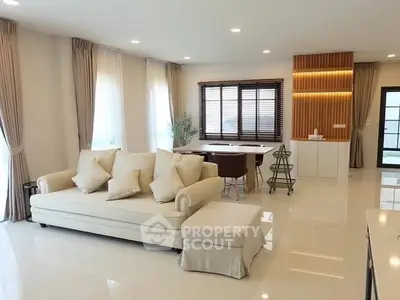 Spacious modern living room with elegant decor and natural light