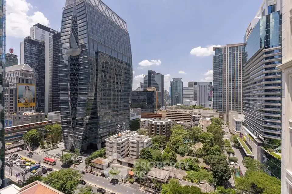 Stunning cityscape view showcasing modern skyscrapers and lush greenery in a vibrant urban setting.