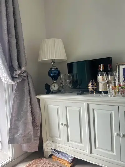 Charming living room corner with elegant decor and natural light