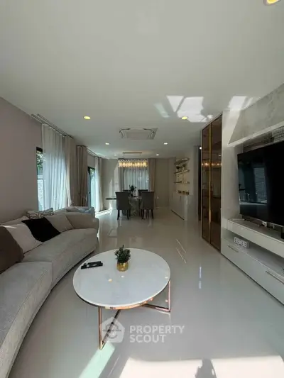 Spacious modern living room with elegant decor and natural light