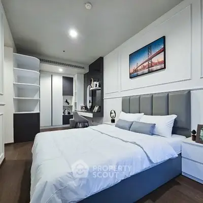 Modern bedroom with stylish decor and cozy ambiance, featuring a comfortable bed and elegant furnishings.