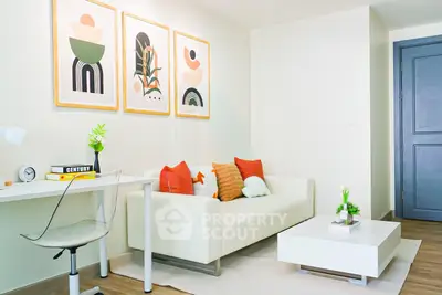 Modern living room with stylish decor and cozy seating area, perfect for relaxation and entertaining.