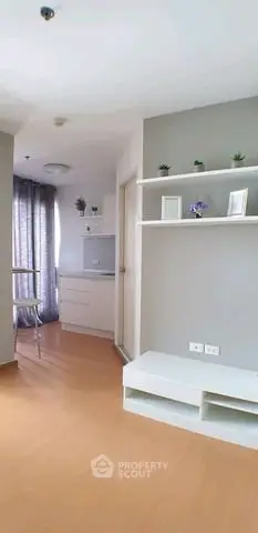 Modern minimalist apartment interior with sleek shelving and natural light.