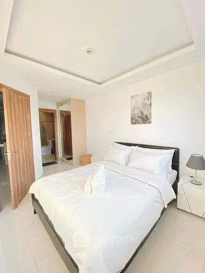 Bright and modern bedroom with elegant decor and cozy ambiance