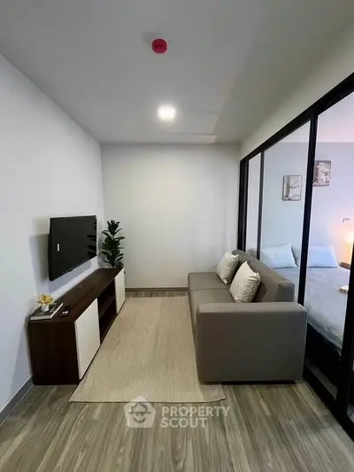 Modern living room with sleek design and cozy ambiance