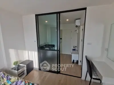 Modern apartment interior with sliding glass doors and stylish decor