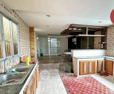 Spacious kitchen with open layout and modern design in a stylish home.