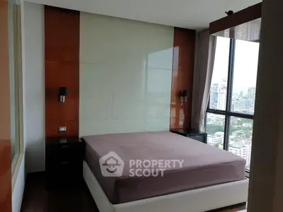 Luxurious bedroom with panoramic city view and modern decor