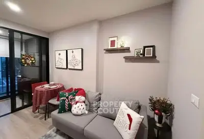 Cozy living room with festive decor and dining area, perfect for holiday gatherings.