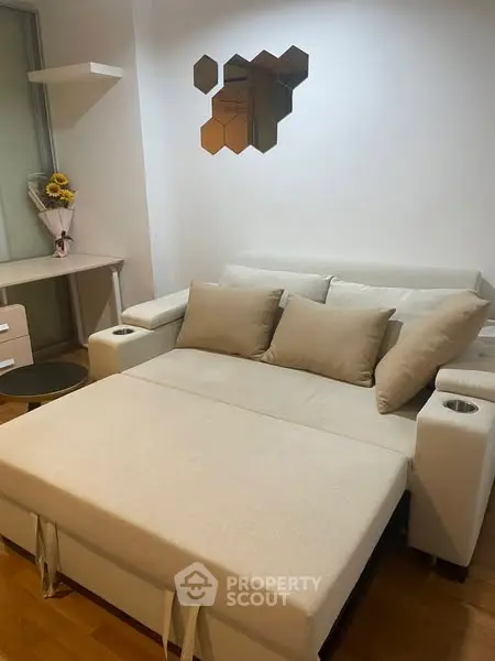 Cozy living room with modern sofa bed and stylish decor