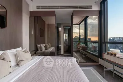 Luxurious modern bedroom with floor-to-ceiling windows and stunning city view