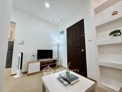 Modern living room with minimalist decor and built-in shelving