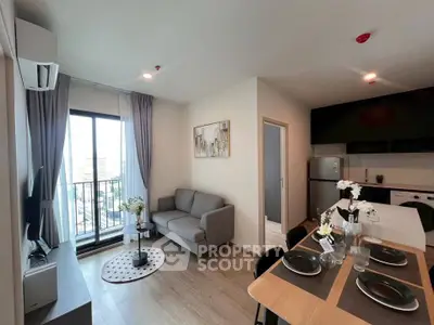 Modern living room with balcony view, stylish decor, and open dining area in a chic apartment.