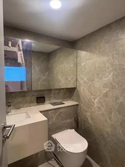 Modern bathroom with sleek design and elegant marble walls