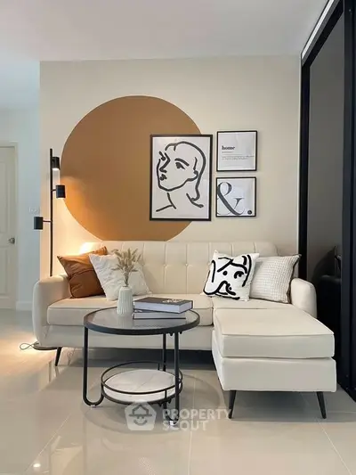 Modern living room with stylish decor and comfortable seating in a contemporary apartment.