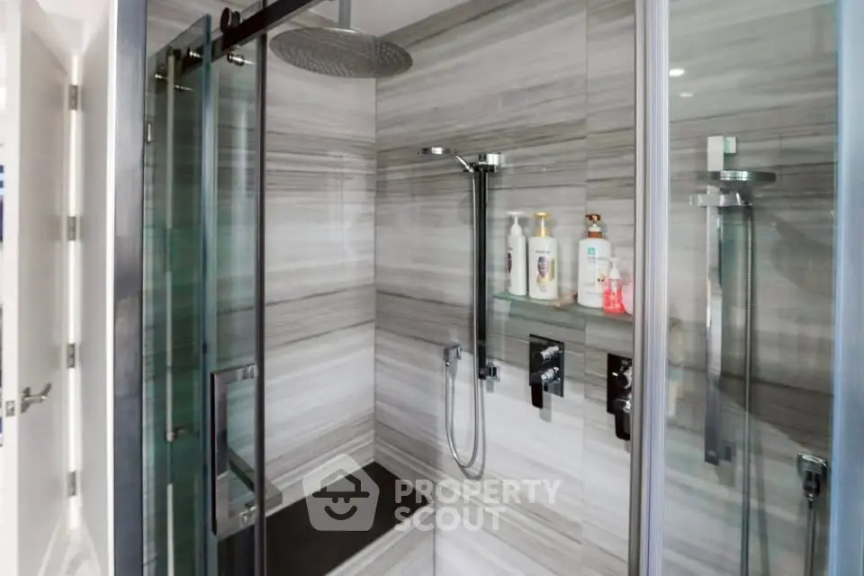 Modern bathroom with sleek shower design and elegant fixtures