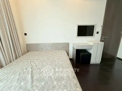 Modern bedroom with stylish decor and elegant furnishings