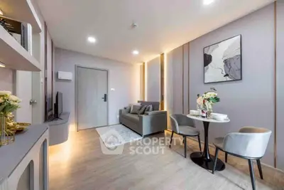 Modern living room with stylish decor and cozy seating area, perfect for relaxation and entertainment.