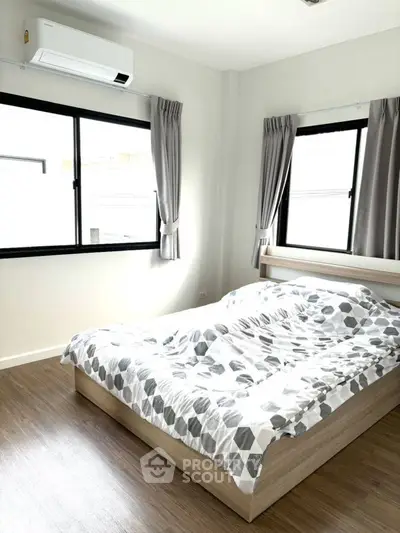 Bright and cozy bedroom with modern decor and natural light