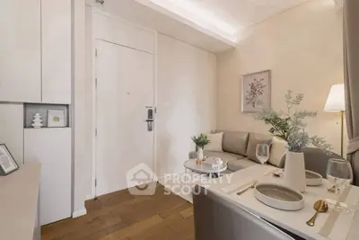 Stylish modern living room with cozy seating and elegant decor in a contemporary apartment.