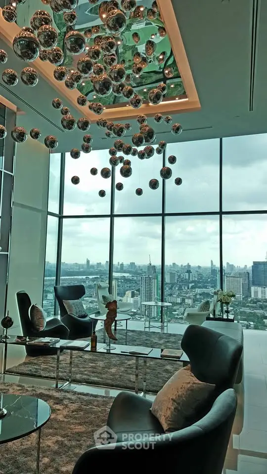 Luxurious high-rise living room with panoramic city views and modern decor