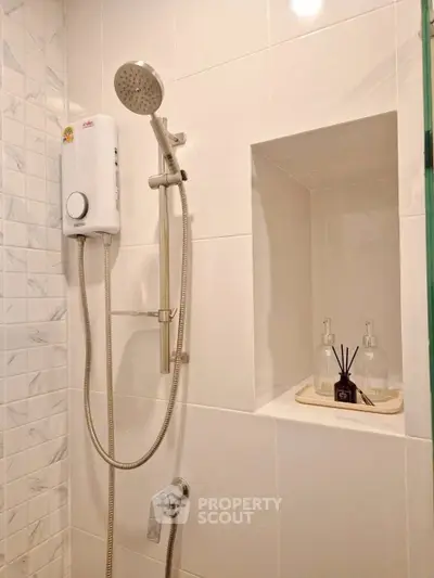 Modern bathroom with sleek shower and elegant tile design