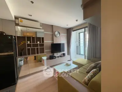 Modern living room with stylish decor and balcony view in urban apartment